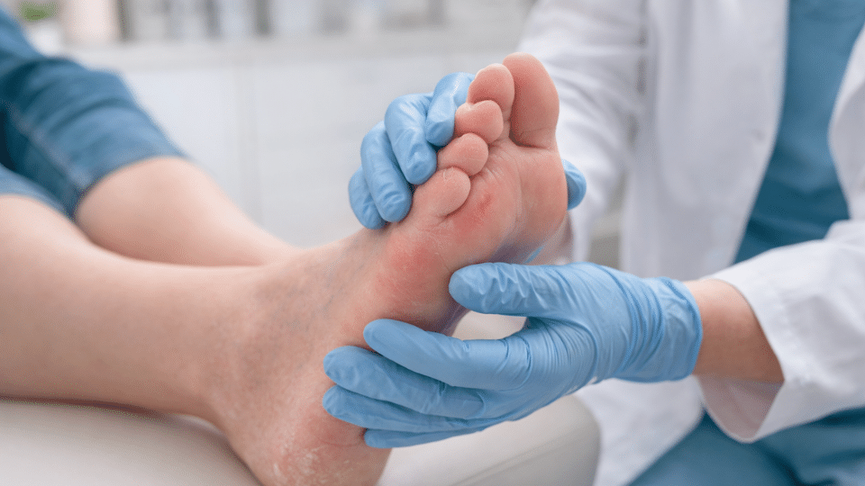 Podiatrist exam for foot problems in diabetics showing early signs